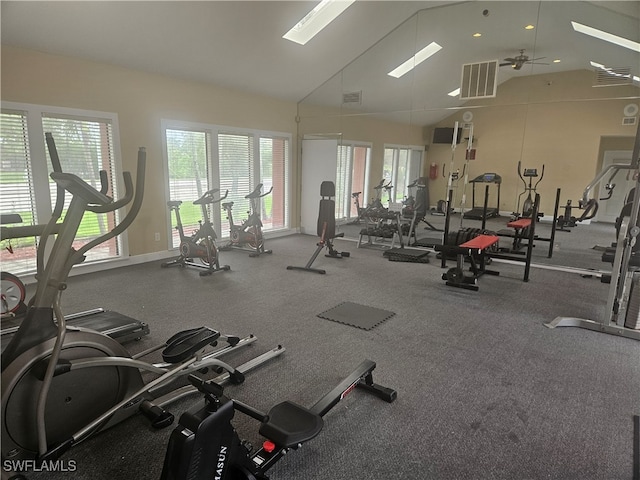 workout area featuring ceiling fan and vaulted ceiling