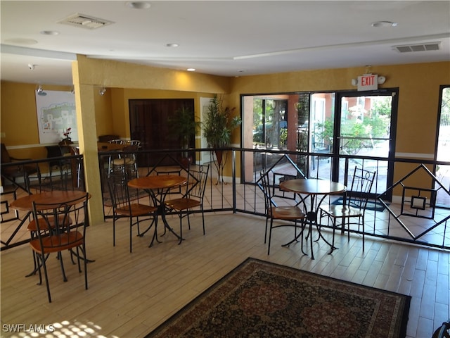 dining area featuring hardwood / wood-style flooring