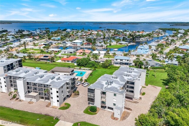 bird's eye view with a water view