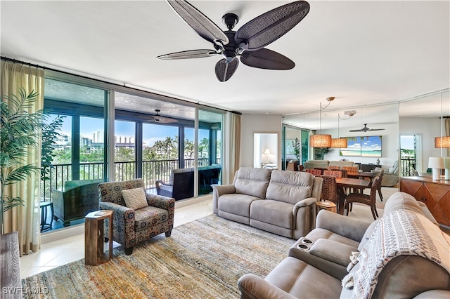 tiled living room featuring ceiling fan