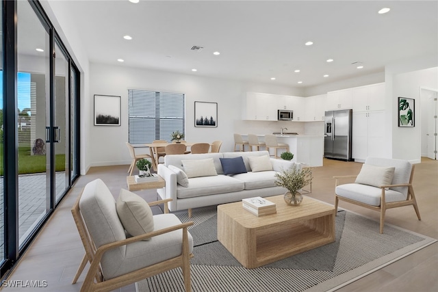 living room with light wood-type flooring