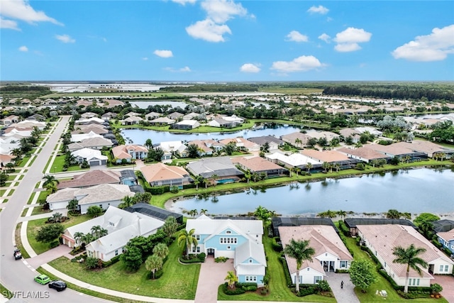 drone / aerial view featuring a water view