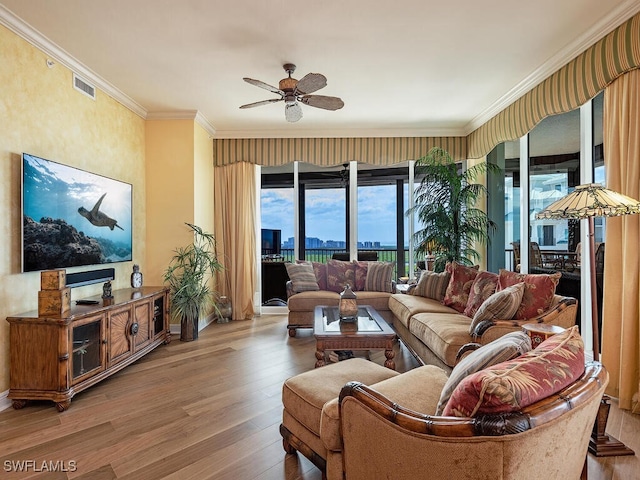 455 Cove Tower Dr Unit 1704, Naples, FL 34110 - living area with ceiling fan, wood finished floors, crown molding, and baseboards