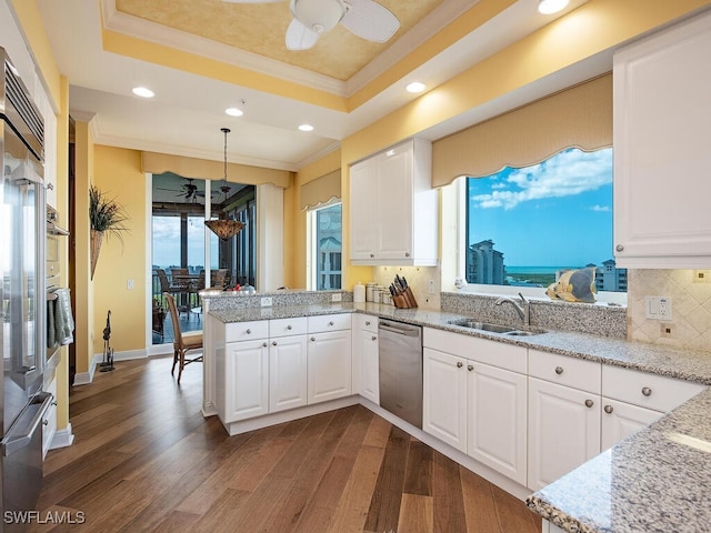 455 Cove Tower Dr Unit 1704, Naples, FL 34110 - kitchen featuring dishwasher, a sink, crown molding, a peninsula, and a ceiling fan