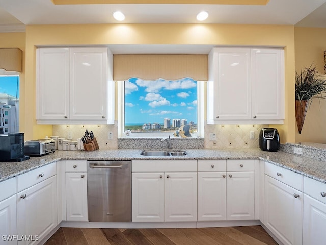 455 Cove Tower Dr Unit 1704, Naples, FL 34110 - kitchen with dishwasher, a sink, decorative backsplash, white cabinets, and recessed lighting