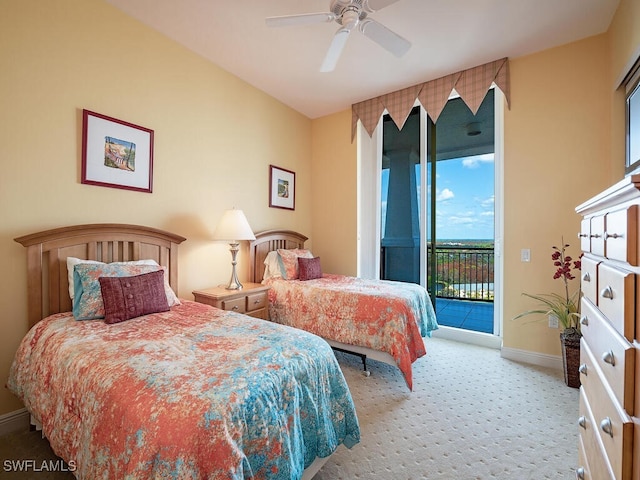 carpeted bedroom with access to outside and ceiling fan