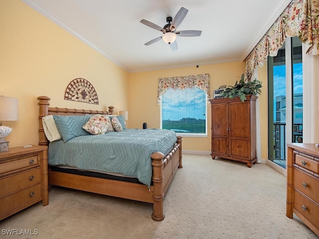 carpeted bedroom featuring ceiling fan, ornamental molding, and access to outside