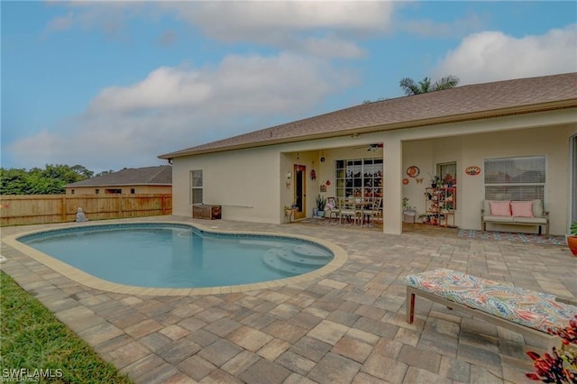 view of pool featuring a patio area