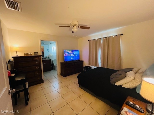 bedroom with light tile patterned flooring and ceiling fan