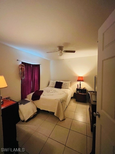 bedroom with light tile patterned floors and ceiling fan