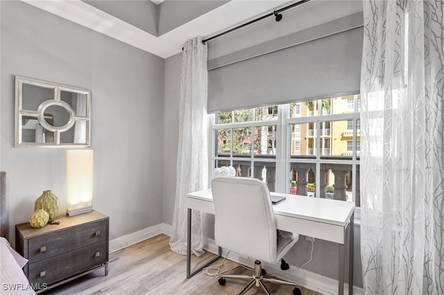 office space featuring light wood-type flooring