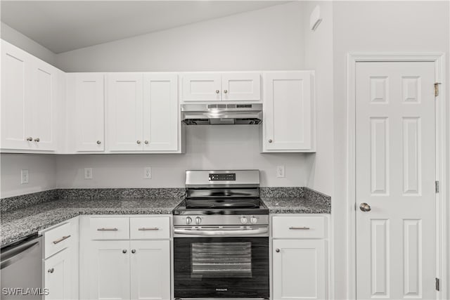 kitchen featuring white cabinets, dark stone counters, vaulted ceiling, and appliances with stainless steel finishes