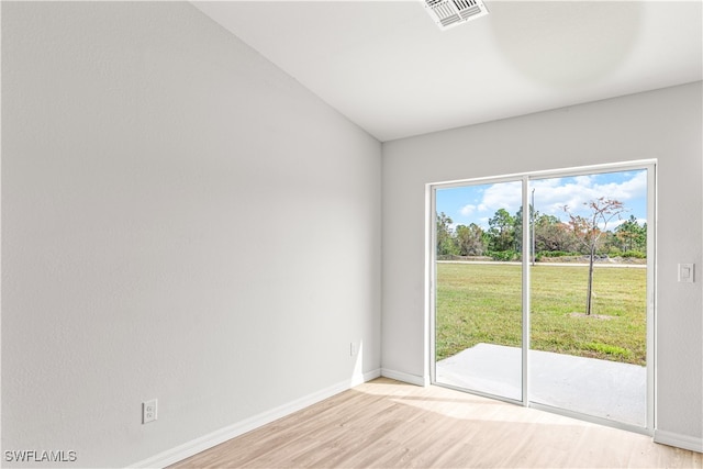 unfurnished room featuring light hardwood / wood-style flooring