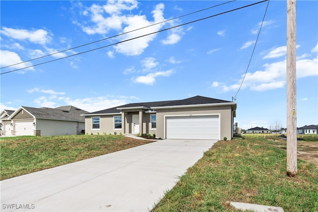 view of front of house featuring a garage and a front lawn