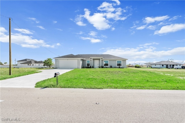 ranch-style house with a garage and a front lawn