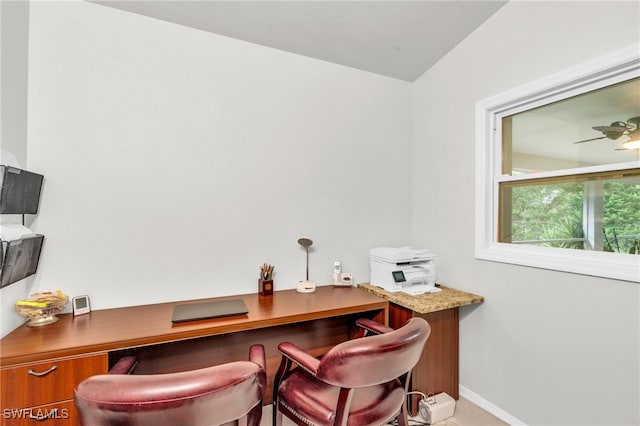 office area with vaulted ceiling