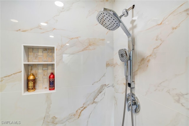 room details featuring a tile shower