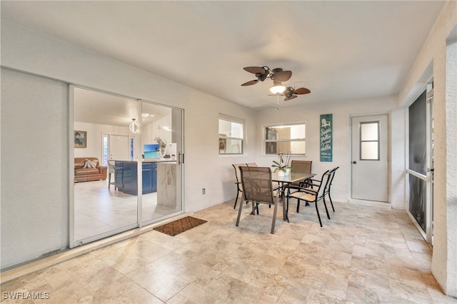 dining room with ceiling fan