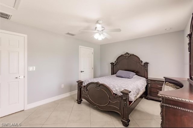 tiled bedroom with ceiling fan