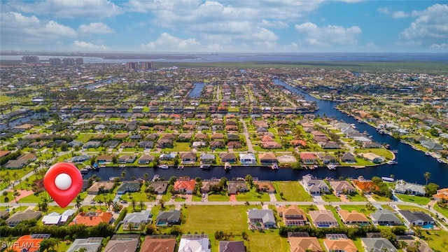 drone / aerial view featuring a water view