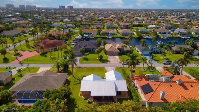 bird's eye view with a water view