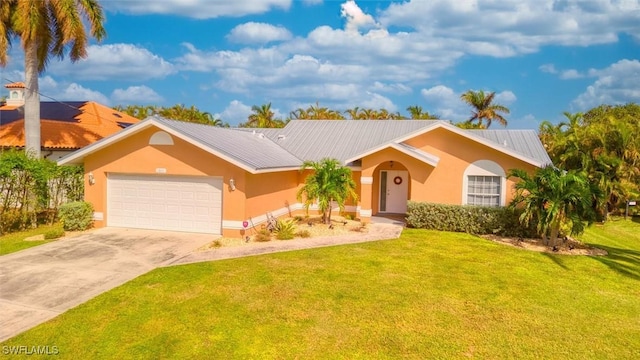 ranch-style home featuring a garage and a front lawn