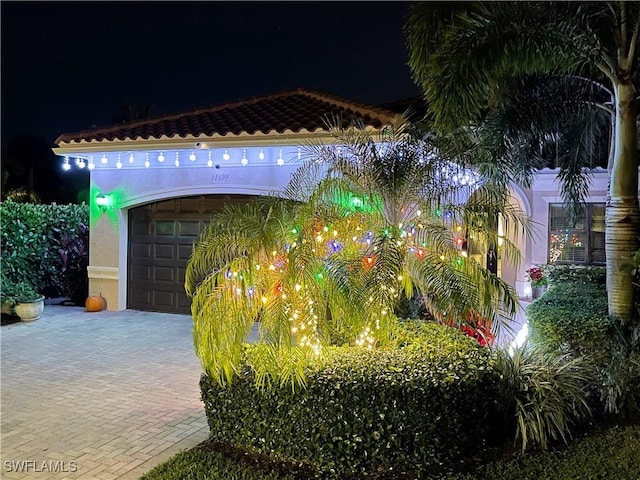 11599 Meadowrun Cir, Fort Myers, FL 33913 - surrounding community with decorative driveway and a garage