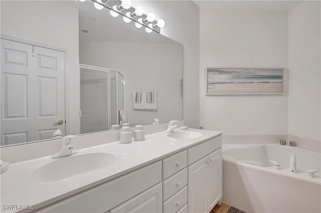 bathroom featuring plus walk in shower and vanity