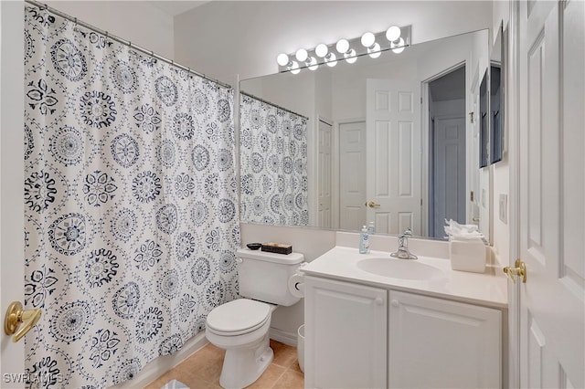 bathroom featuring tile patterned flooring, vanity, toilet, and a shower with curtain