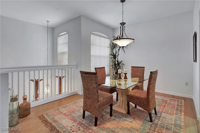 dining area featuring hardwood / wood-style floors