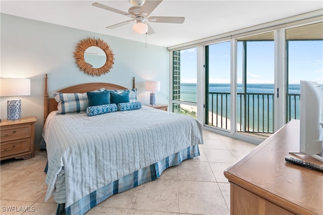 tiled bedroom featuring multiple windows, access to outside, and ceiling fan