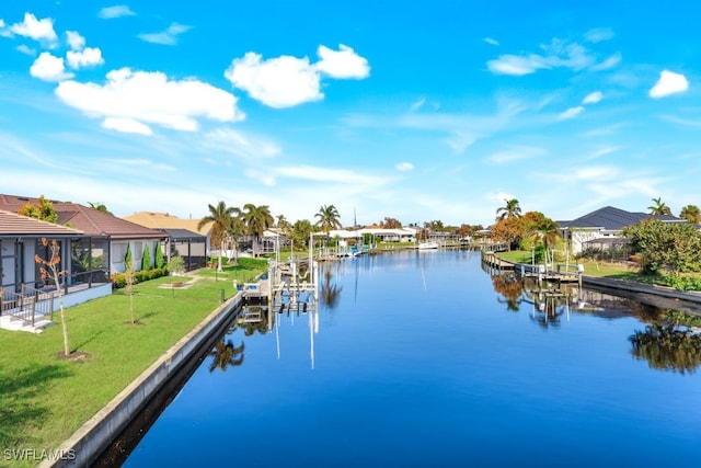 198 Gulfview Rd, Punta Gorda, FL 33950 - dock area featuring a residential view, a water view, boat lift, and a yard