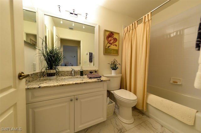 full bathroom with vanity, shower / tub combo with curtain, and toilet