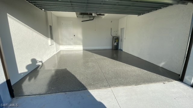 garage with electric water heater