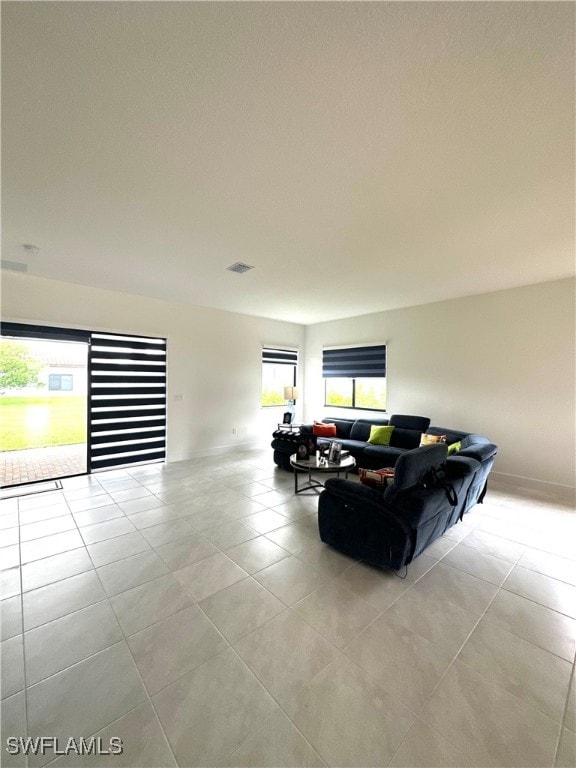 living room featuring light tile patterned floors