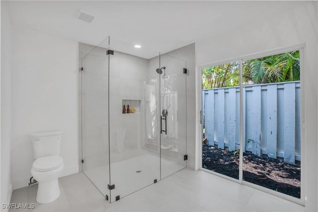 full bath featuring a stall shower, tile patterned flooring, toilet, and recessed lighting