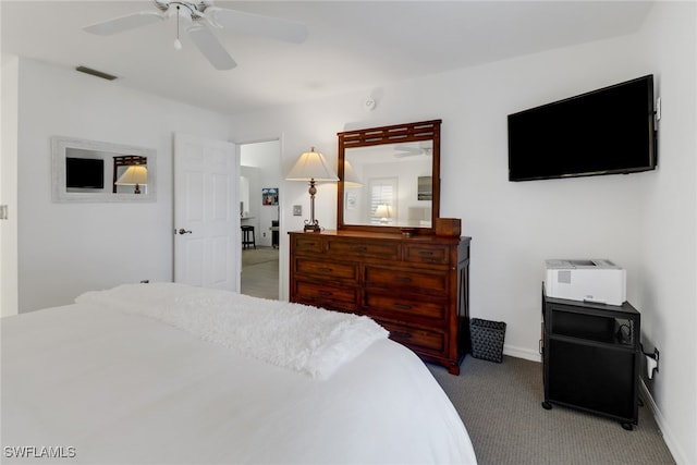 bedroom with light colored carpet and ceiling fan