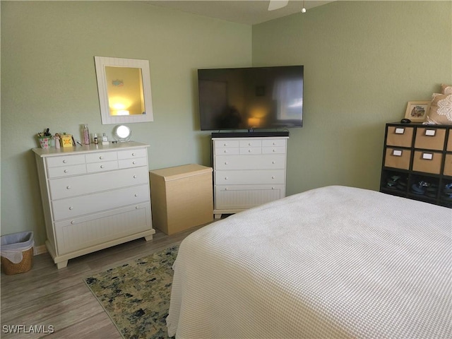 bedroom featuring light wood finished floors