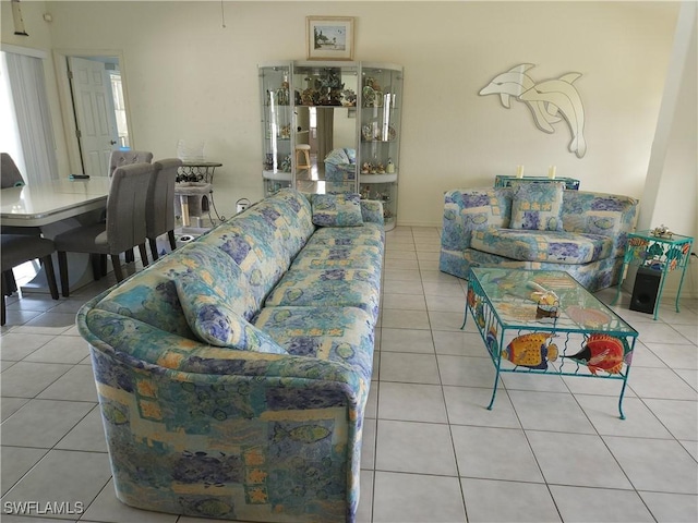 living room with light tile patterned floors