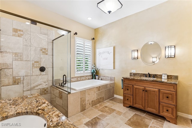 bathroom with vanity and plus walk in shower