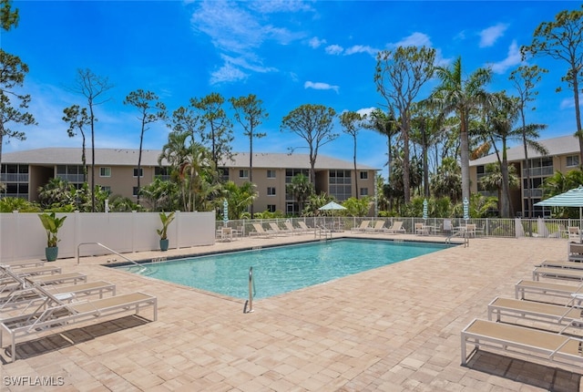 view of swimming pool featuring a patio