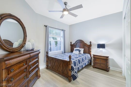 bedroom featuring ceiling fan and light wood-type flooring