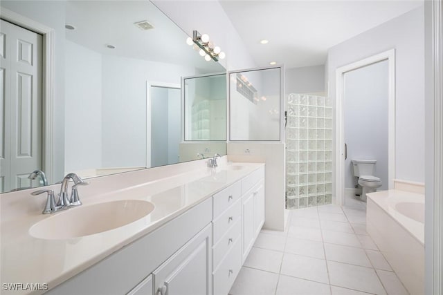 full bathroom featuring toilet, tile patterned flooring, a sink, and visible vents