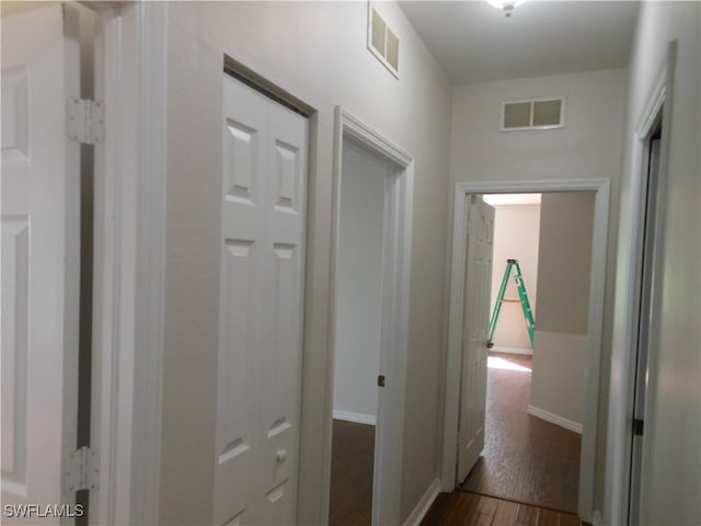 hall featuring dark hardwood / wood-style floors