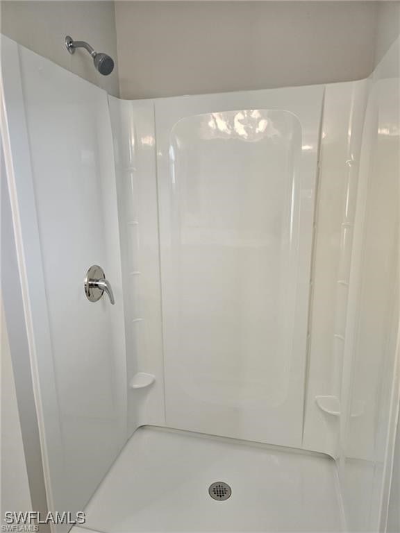 917 Martha Ave S, Lehigh Acres, FL 33974 - full bath with a shower