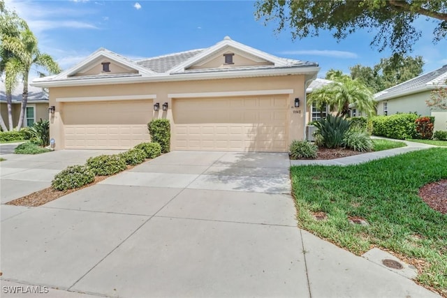 single story home with driveway, stucco siding, and a garage