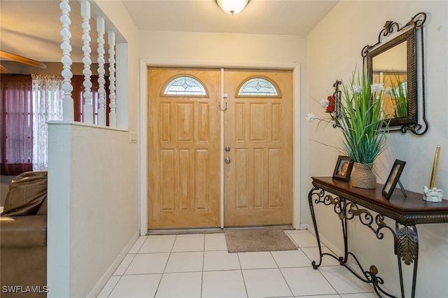 entrance foyer with light tile patterned flooring