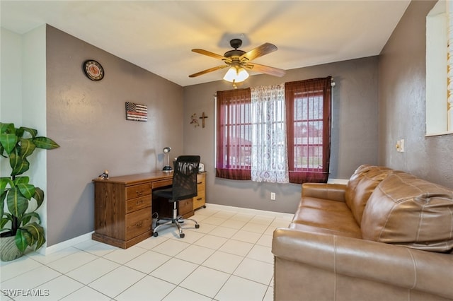 home office featuring ceiling fan and light tile patterned floors