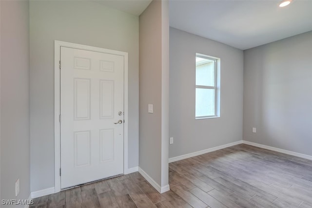 entryway with light hardwood / wood-style floors