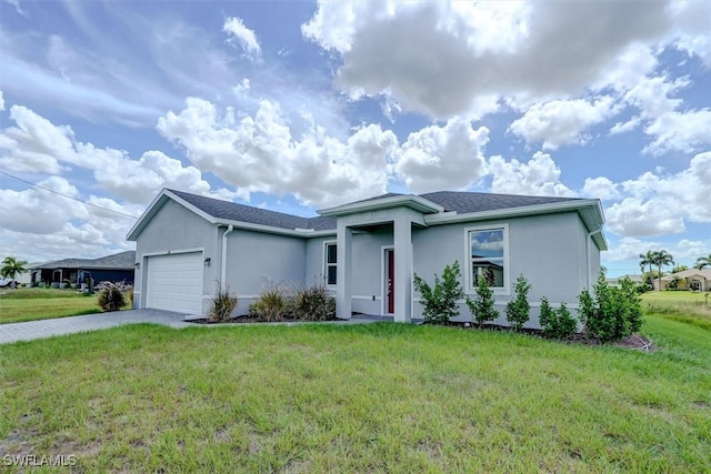 ranch-style home featuring a front lawn and a garage